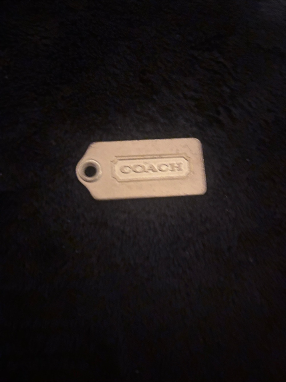Coach brass bag tag